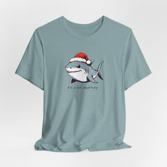 Shark Wearing Santa Hat "it's a bit sharkey" Christmas Unisex Short Sleeve Tee